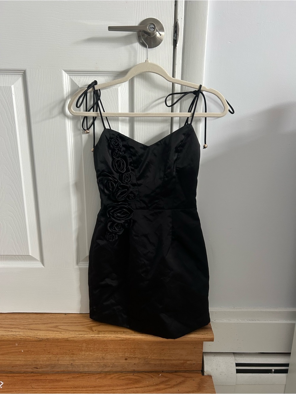 Hello Molly Black Tie-Shoulder Mini Dress with Rosette Accents